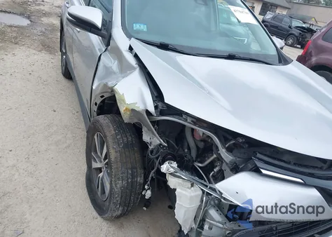 2018 Toyota Rav4 Xle from USA, damaged, VIN 2T3RFREV9JW801523